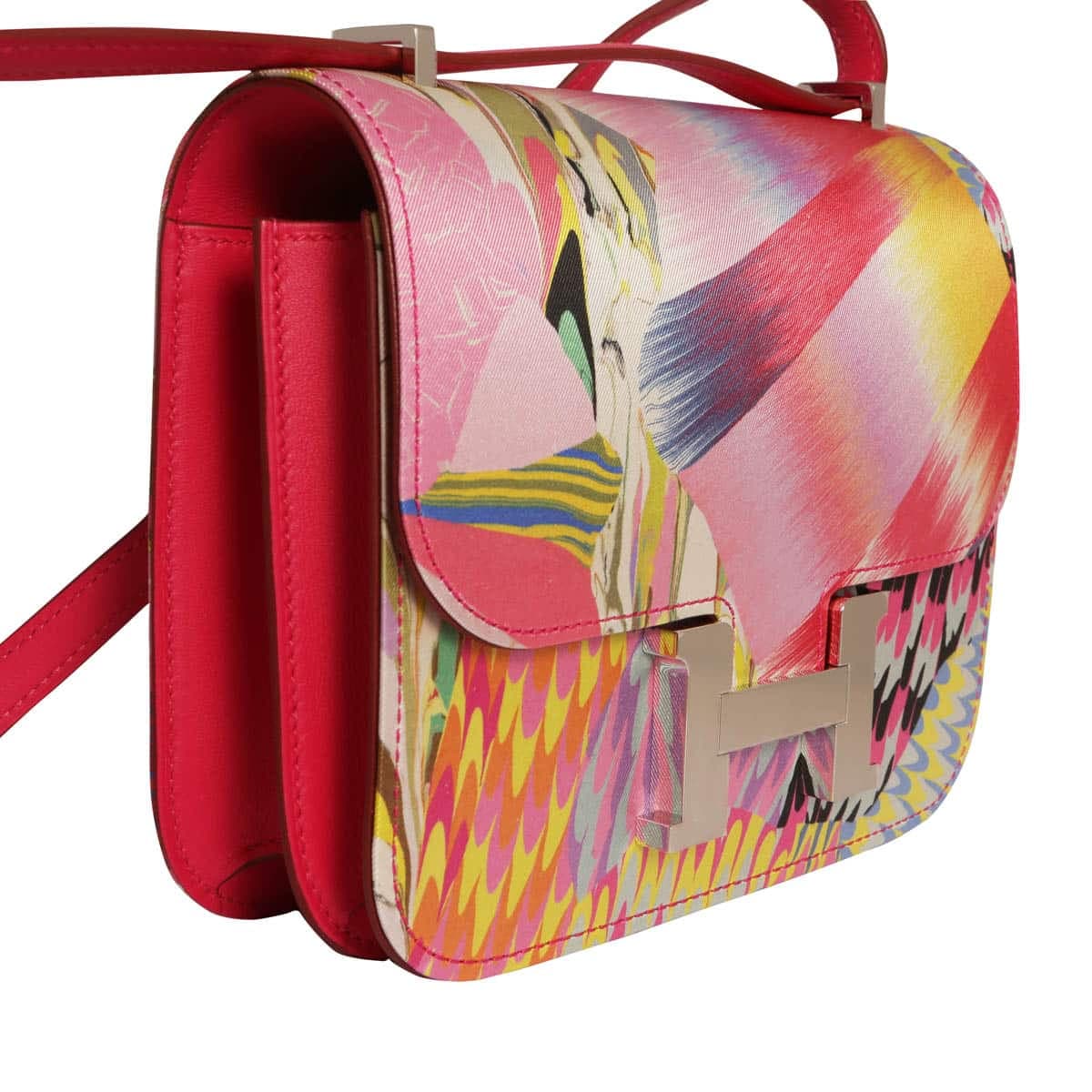 Hermes Constance silk print in fuchsia with silver hardware