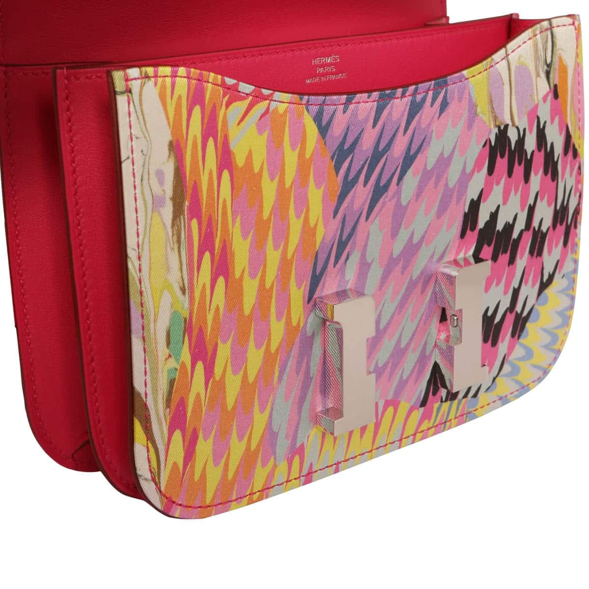 Hermes Constance silk print in fuchsia with silver hardware