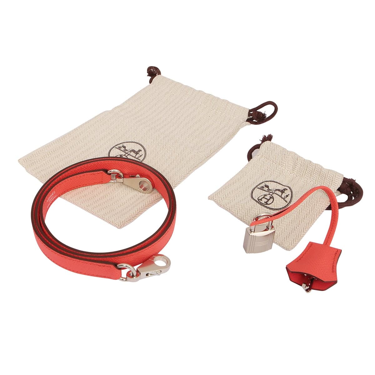 Hermes Kelly 25 handbag accessories in Texas Rose colour with silver hardware.