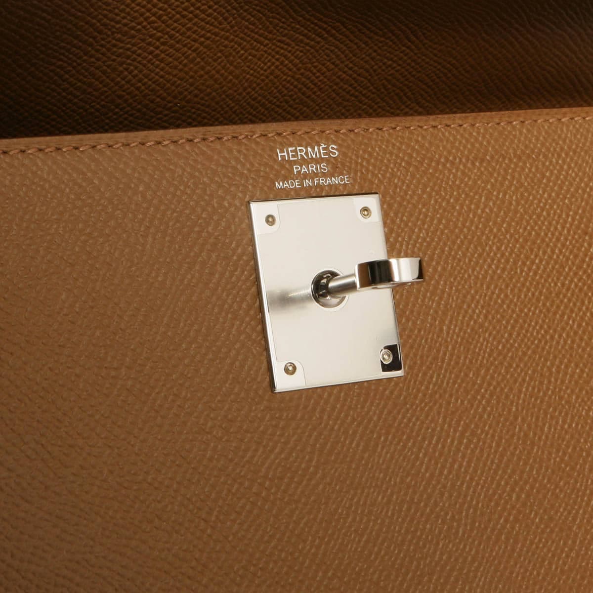 Hermes Kelly 28 epsom biscuit showing silver toured