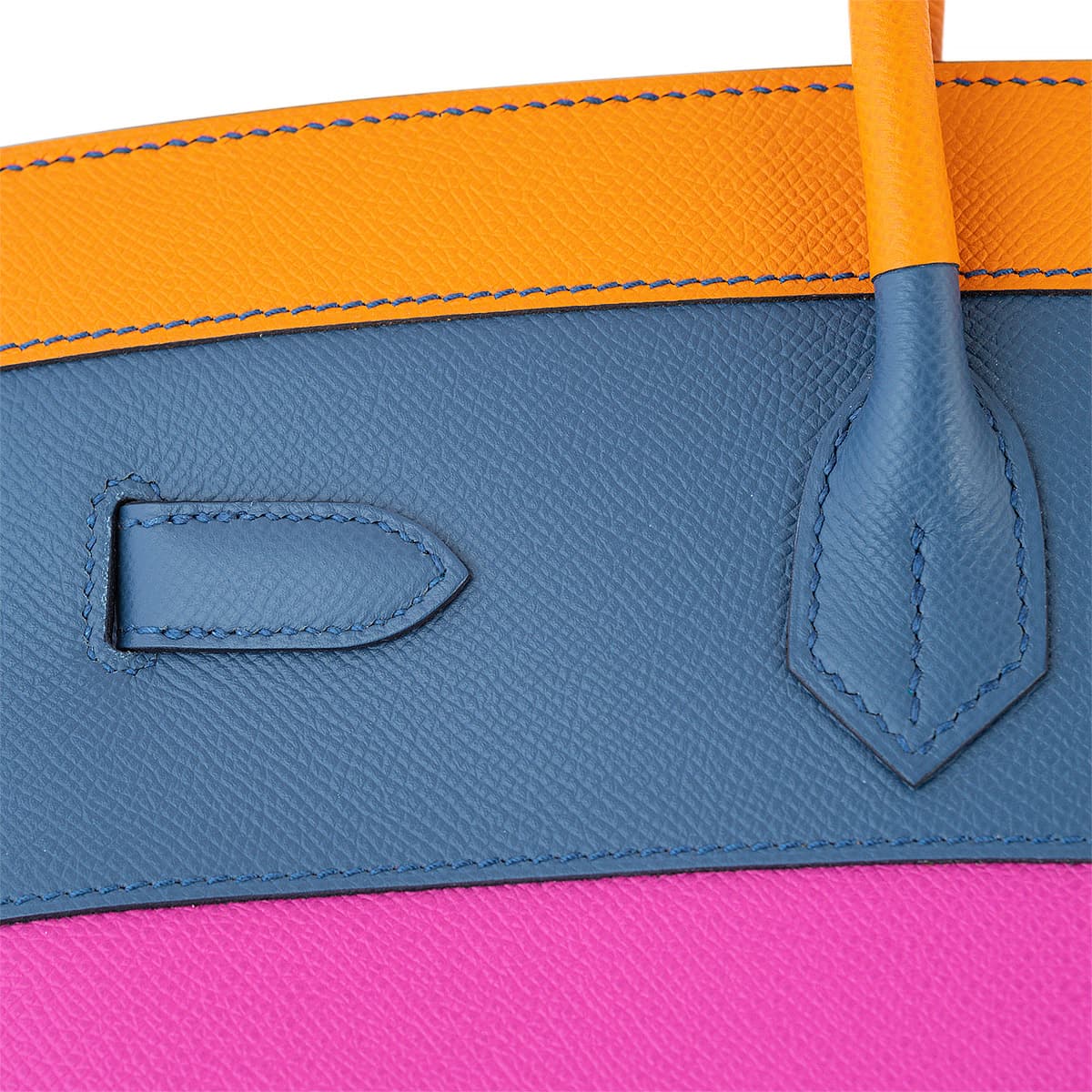 Back view of the Birkin 35 showing the three colours orange, blue and fuchsia with navy stitching.
