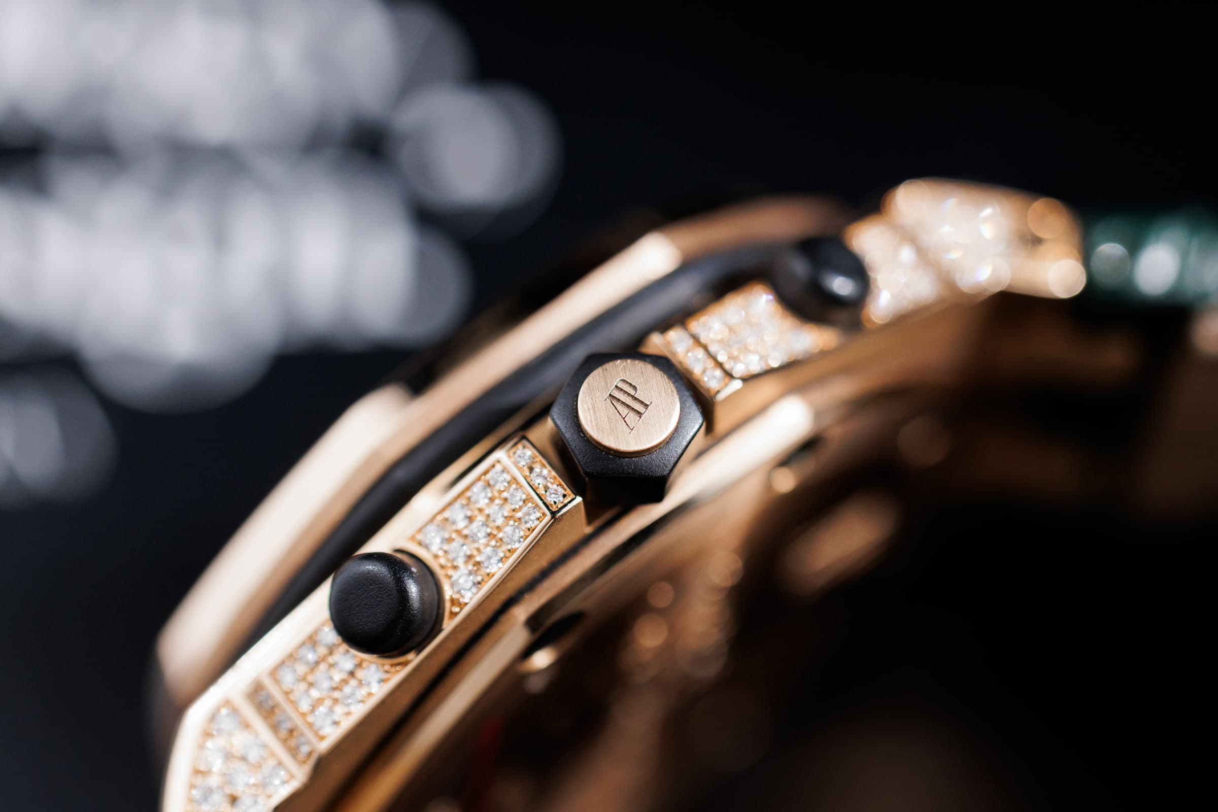 Audemars Piguet Royal Oak Offshore 26067OR diamond-set chronograph in rose gold, side profile with crown and pushers