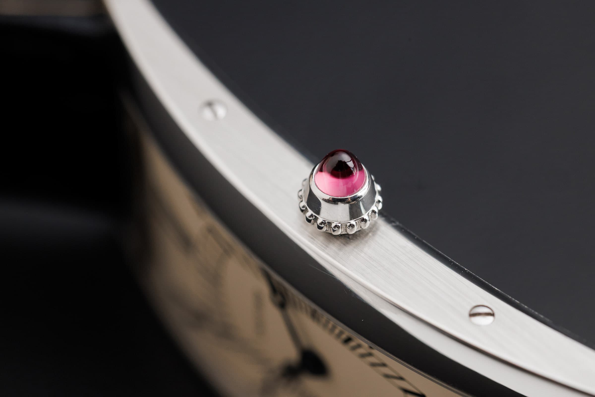 Cartier Tank Cintrée in platinum, crown with cabochon
