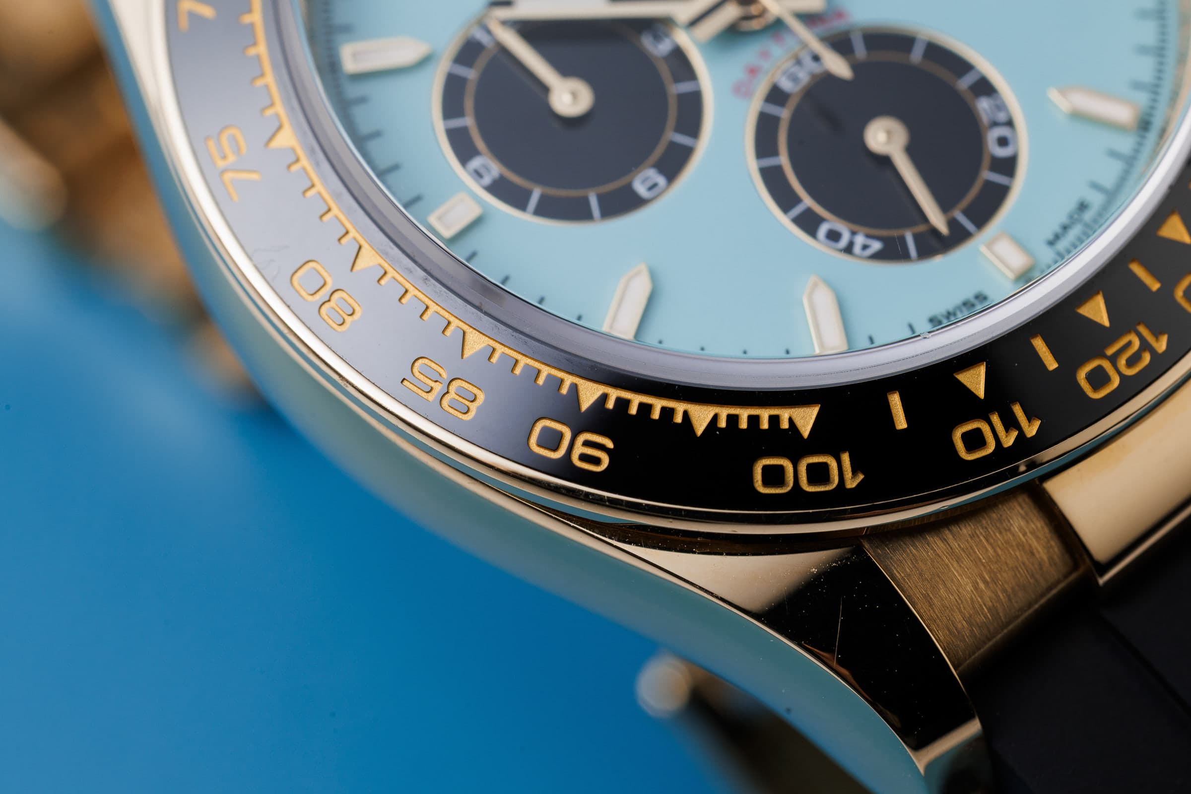 Rolex Cosmograph Daytona 126518LN in yellow gold with turquoise dial, dial and bezel detail